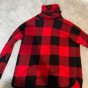 Red and black checkered sweater